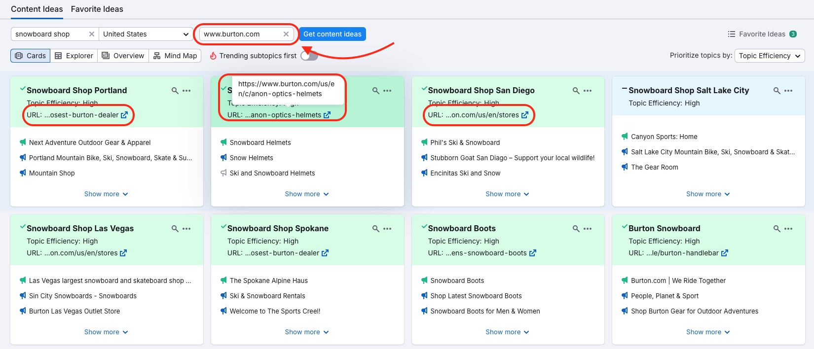 Content Ideas tab in Topic Research. A target domain, entered previously, is highlighted with red, as well as URLs on the green idea cards.